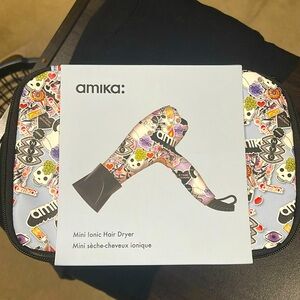 Brand new Amika mini ionic travel hair dryer